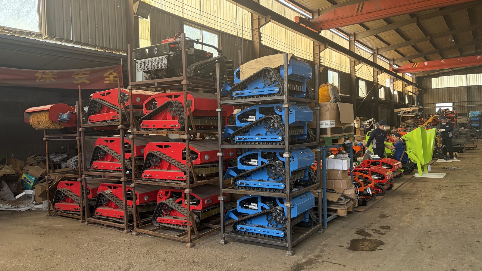 TorqMax factory interior — production workshop with machinery assembly in progress