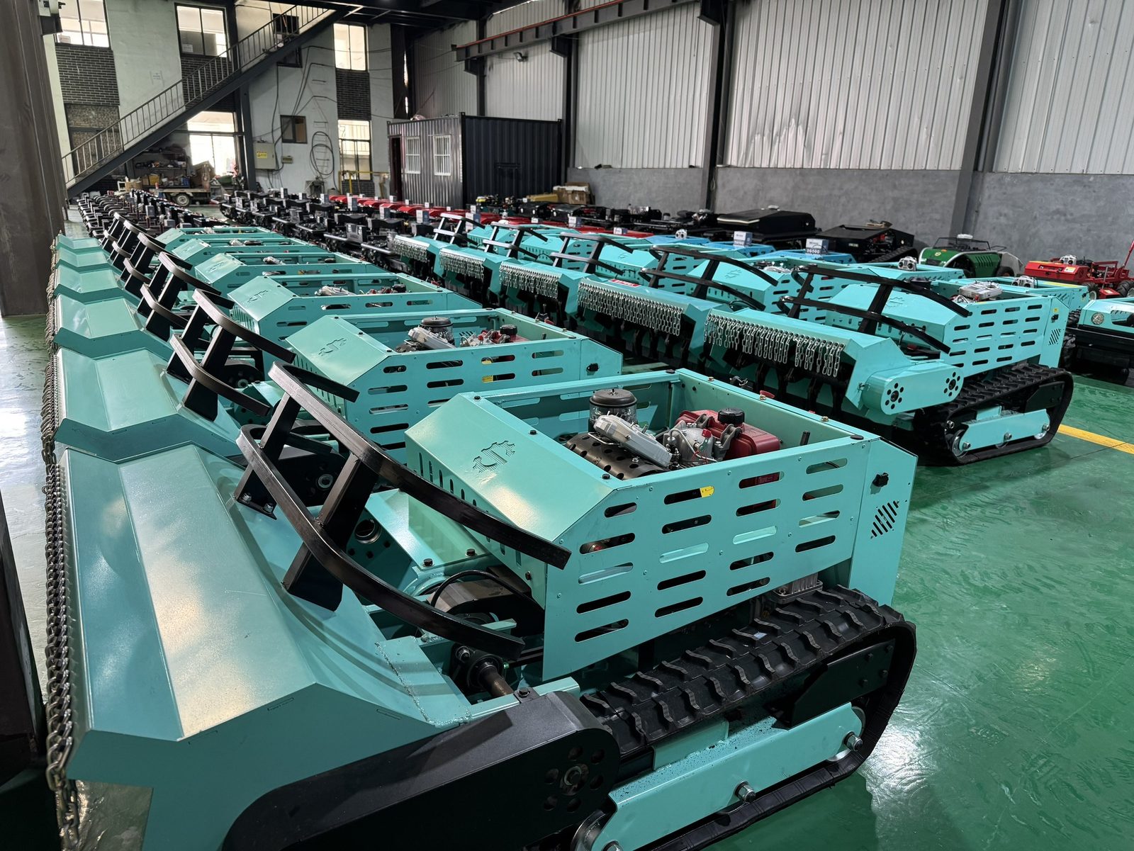 TorqMax machinery factory floor in Shenzhen — tracked machines under assembly