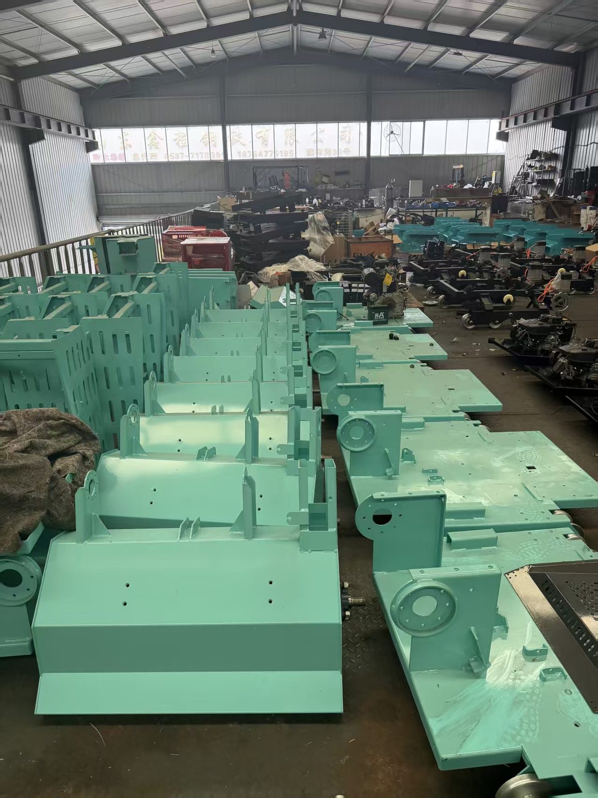 TorqMax export packing area — machinery crated for international shipping