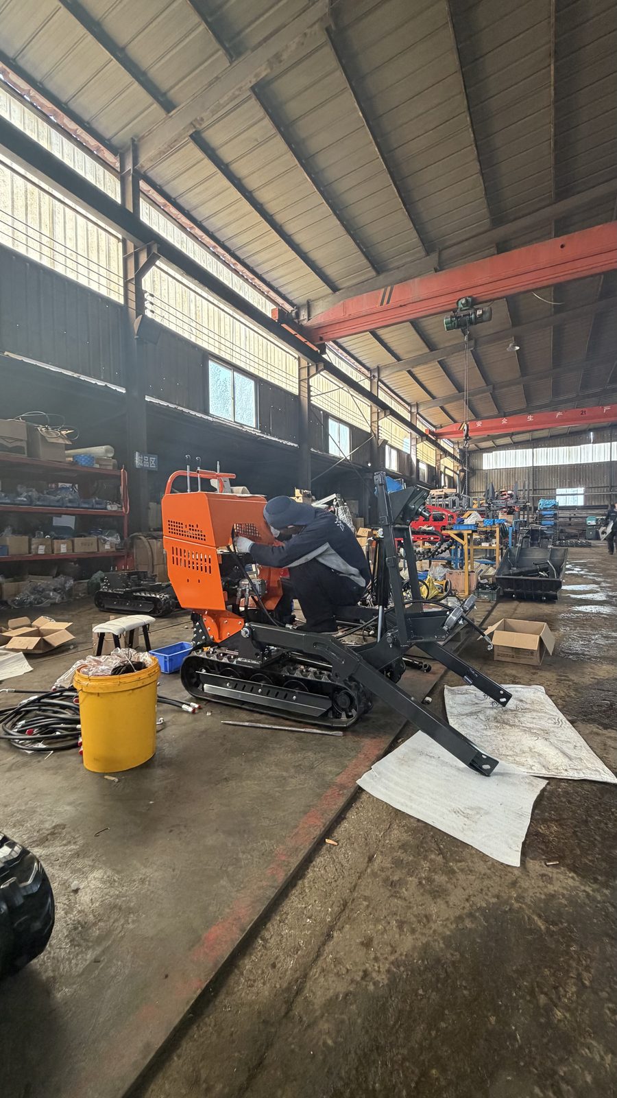 TorqMax factory interior — assembly bay where tracked machines are built