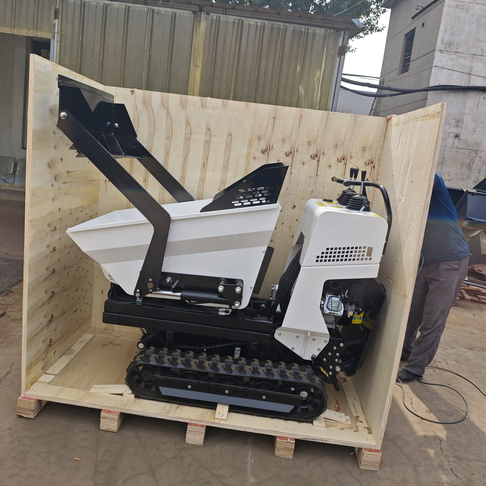 TorqMax export packing — machinery secured in wooden crates for container shipping