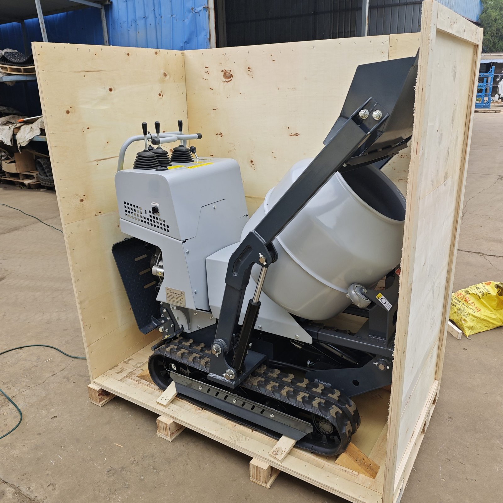 TorqMax export packing — machines palletized and strapped ready for loading